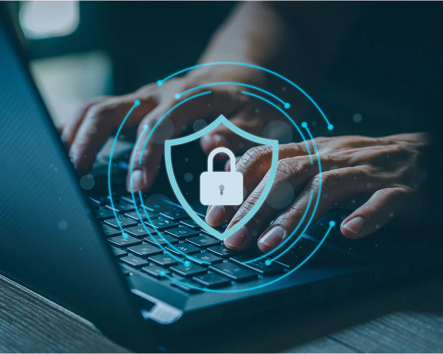 man using laptop with antivirus icon